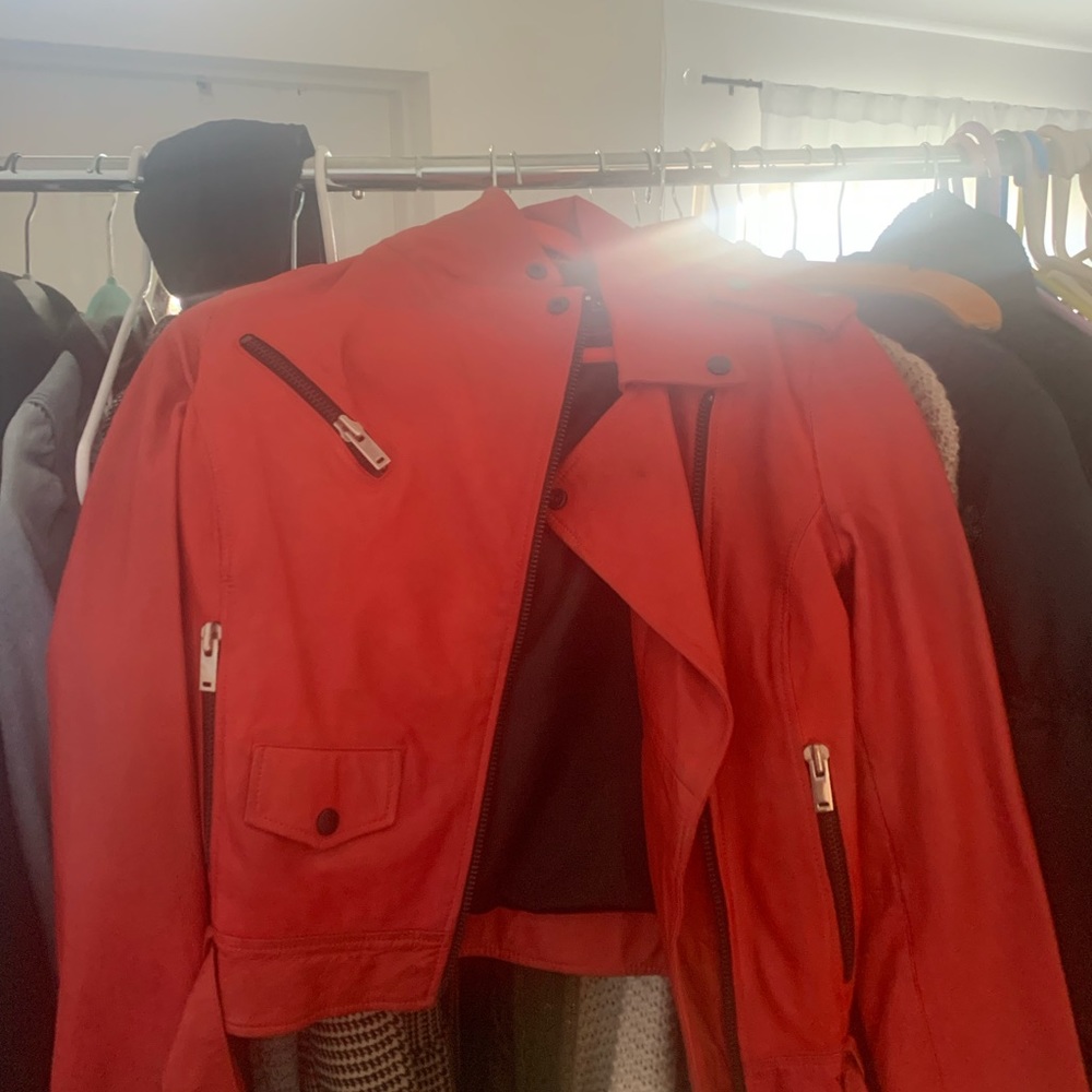 Women red leather jacket